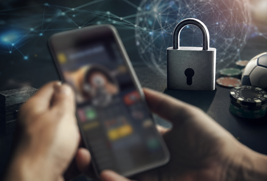 Celular com símbolo visual de bloqueio sobre ambiente digital relacionado a apostas online